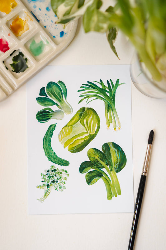 A white art print depicting green Chinese vegetables: cilantro, green onion, bok choy, and napa cabbage.