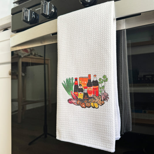 kitchen towel with watercolor of Asian sauces and vegetables