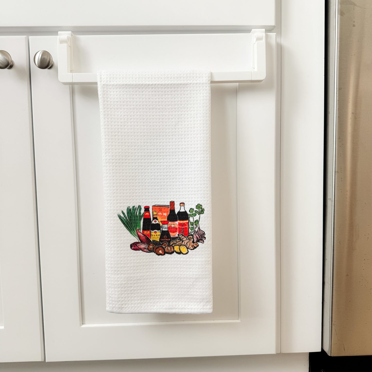 kitchen towel with watercolor of Asian sauces and vegetables