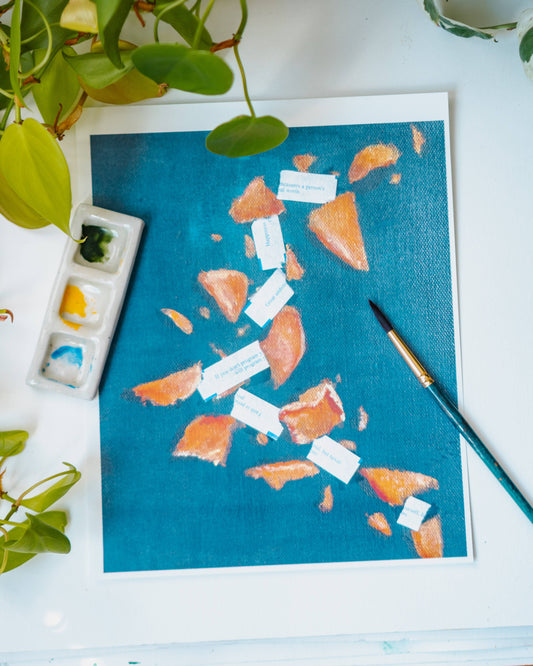 A watercolor print of broken fortune cookies and scattered fortunes on a blue background.