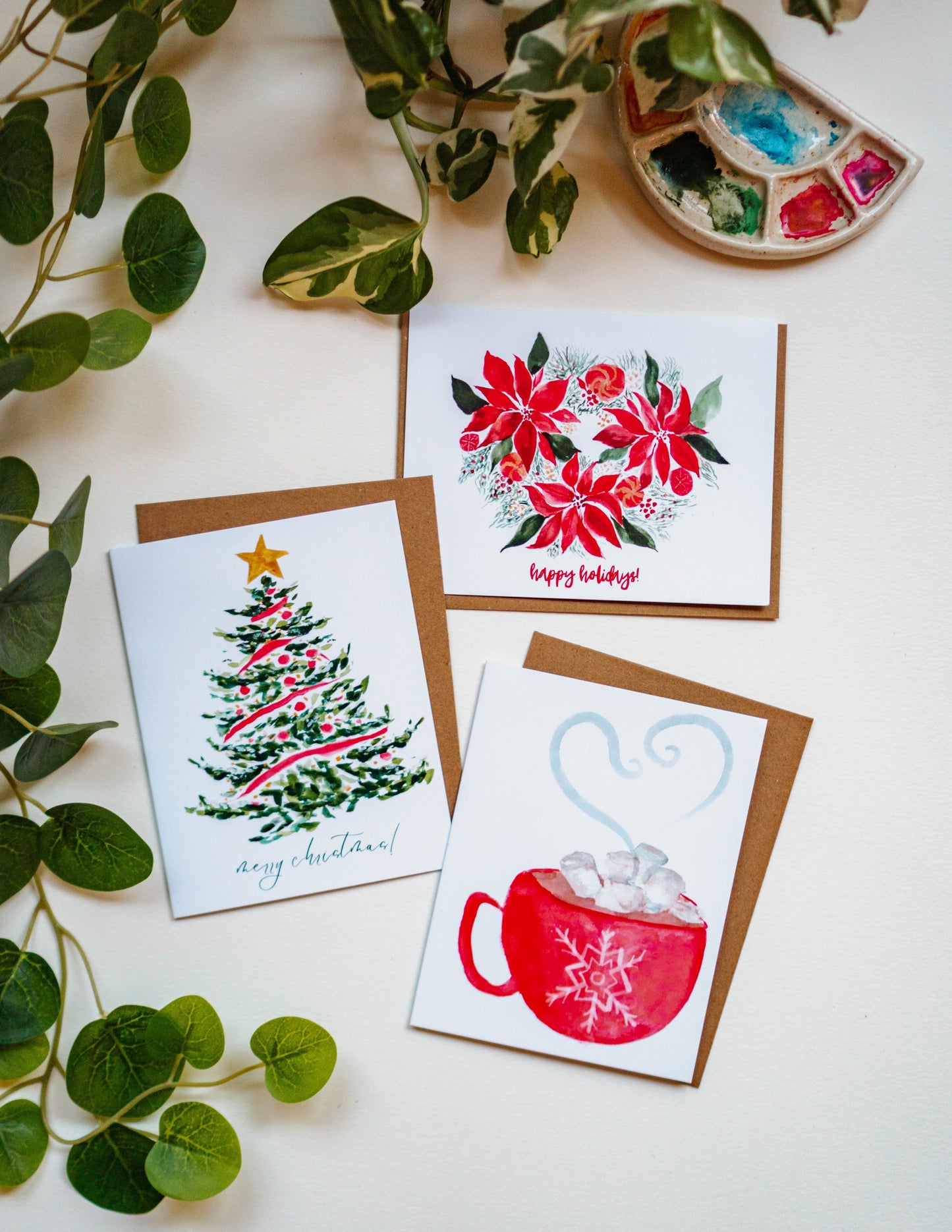 A collection of Menmin Made's holiday cards, including the Hot Chocolate Holiday Card.