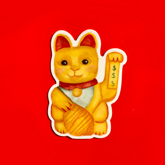 sticker of a yellow lucky cat and dollar signs