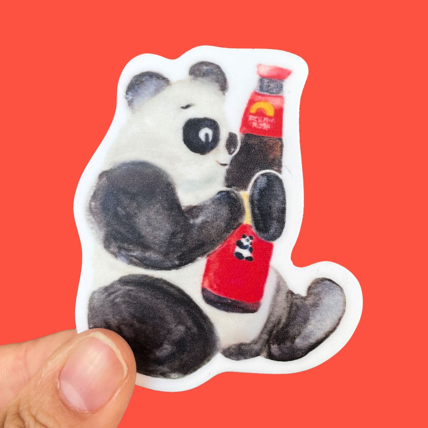A watercolor sticker of a panda smiling and holding a red bottle of Panda brand oyster sauce.