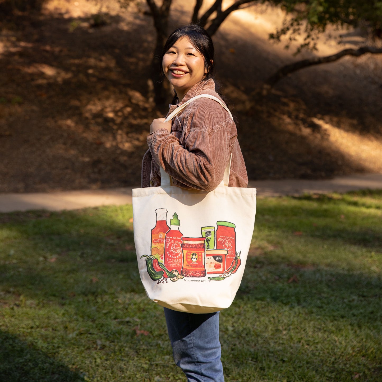 Girl Wearing Asian Sauce Tote Bag