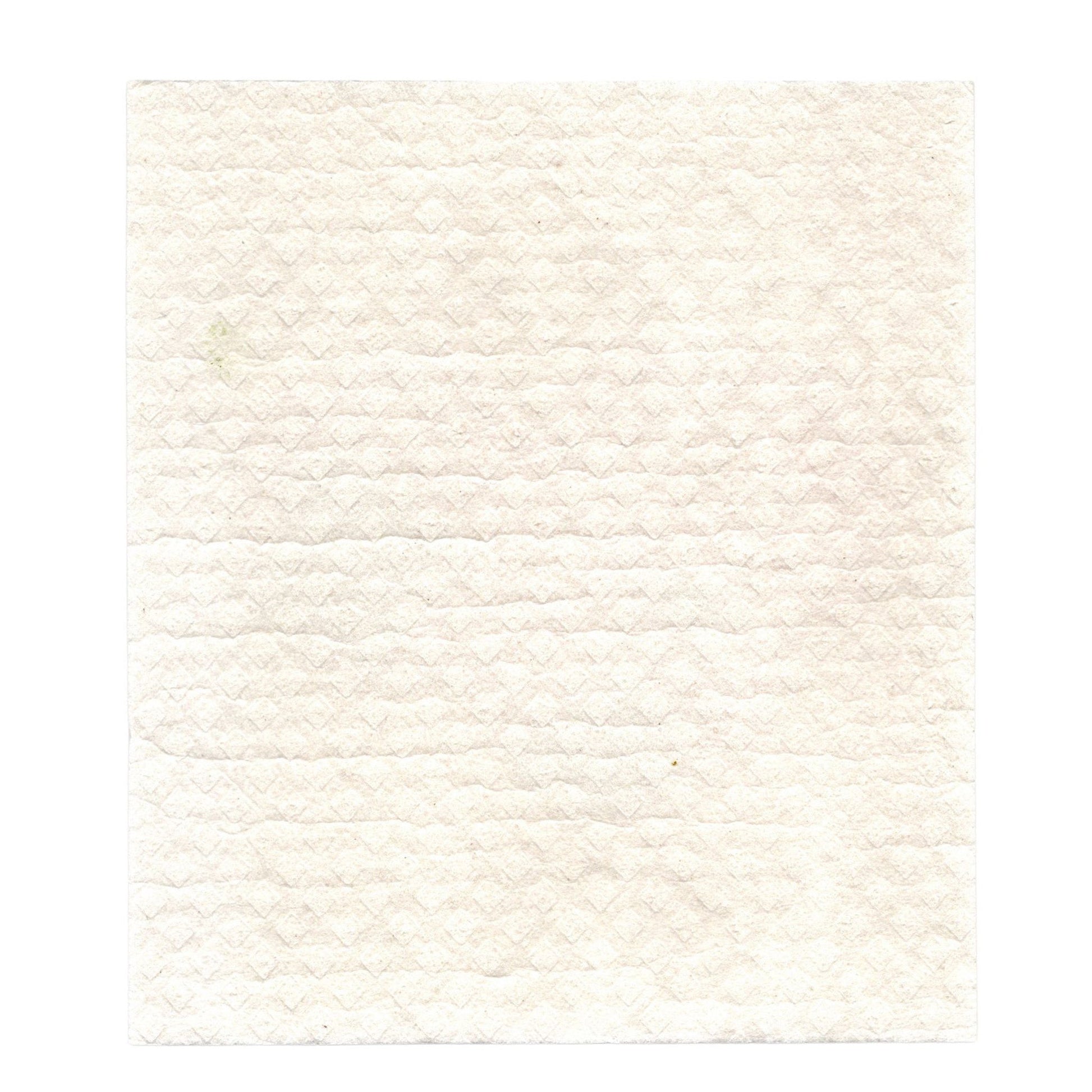 The white, textured back of a California Poppy in Soy Sauce Swedish Dishcloth.