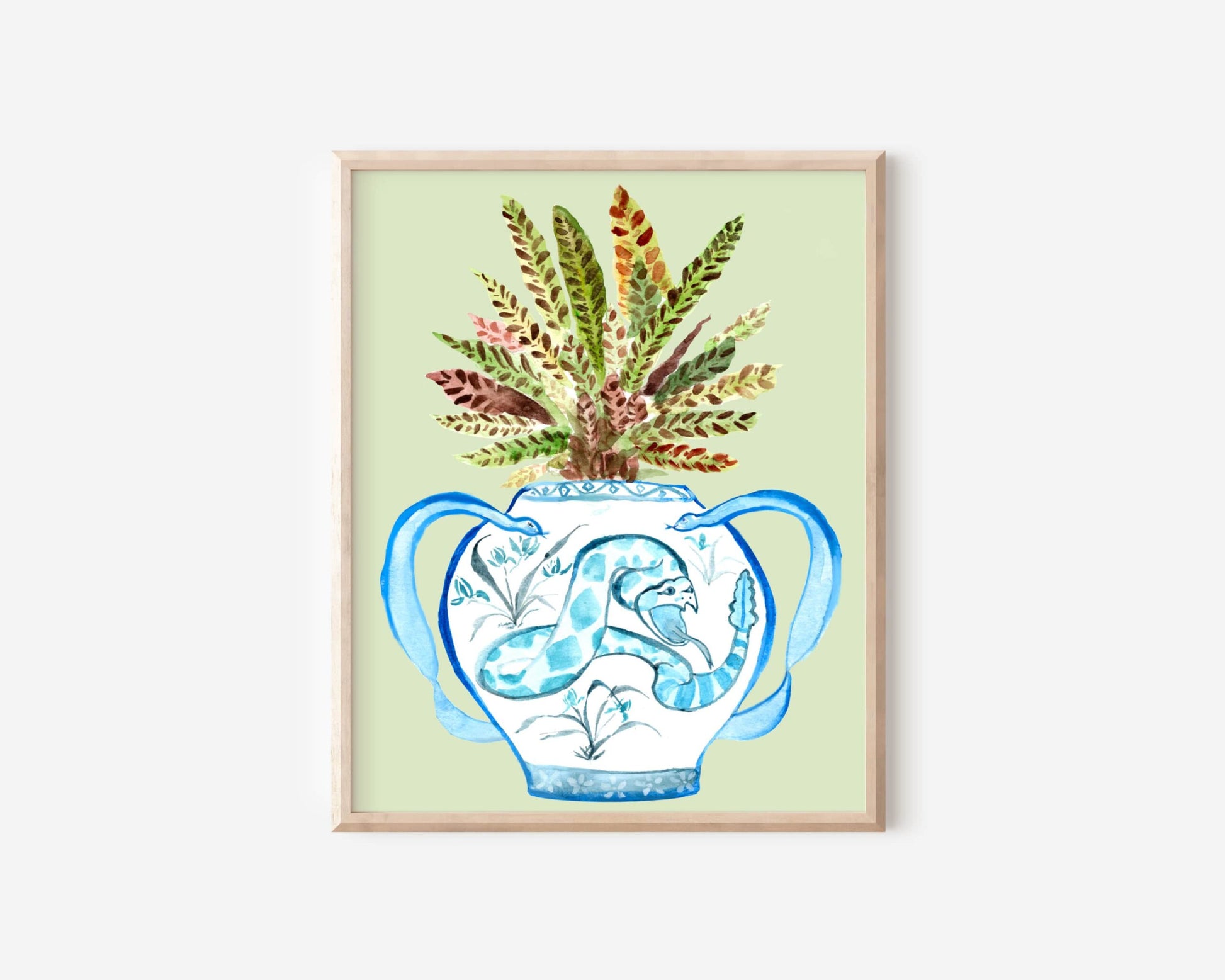 A print of a rattlesnake plant in a blue and white porcelain vase, decorated with a snake.