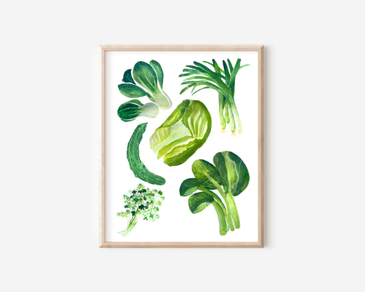 A white art print hung on a wall depicting green Chinese vegetables: cilantro, green onion, bok choy, and napa cabbage.