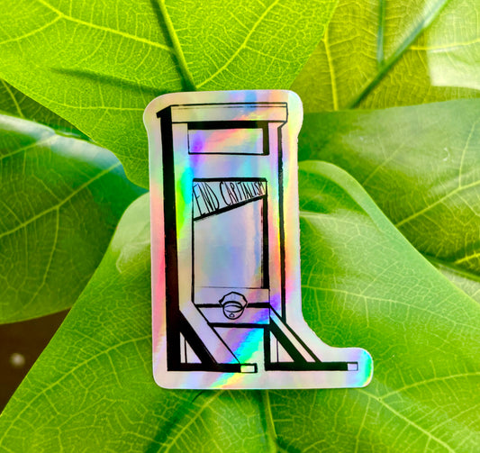 A holographic sticker of a guillotine, with the words "End Capitalism" written on the blade.