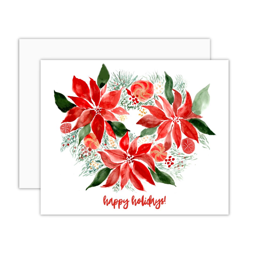 A white greeting card with green and red watercolor poinsettias and the words "happy holidays!" written on the bottom.