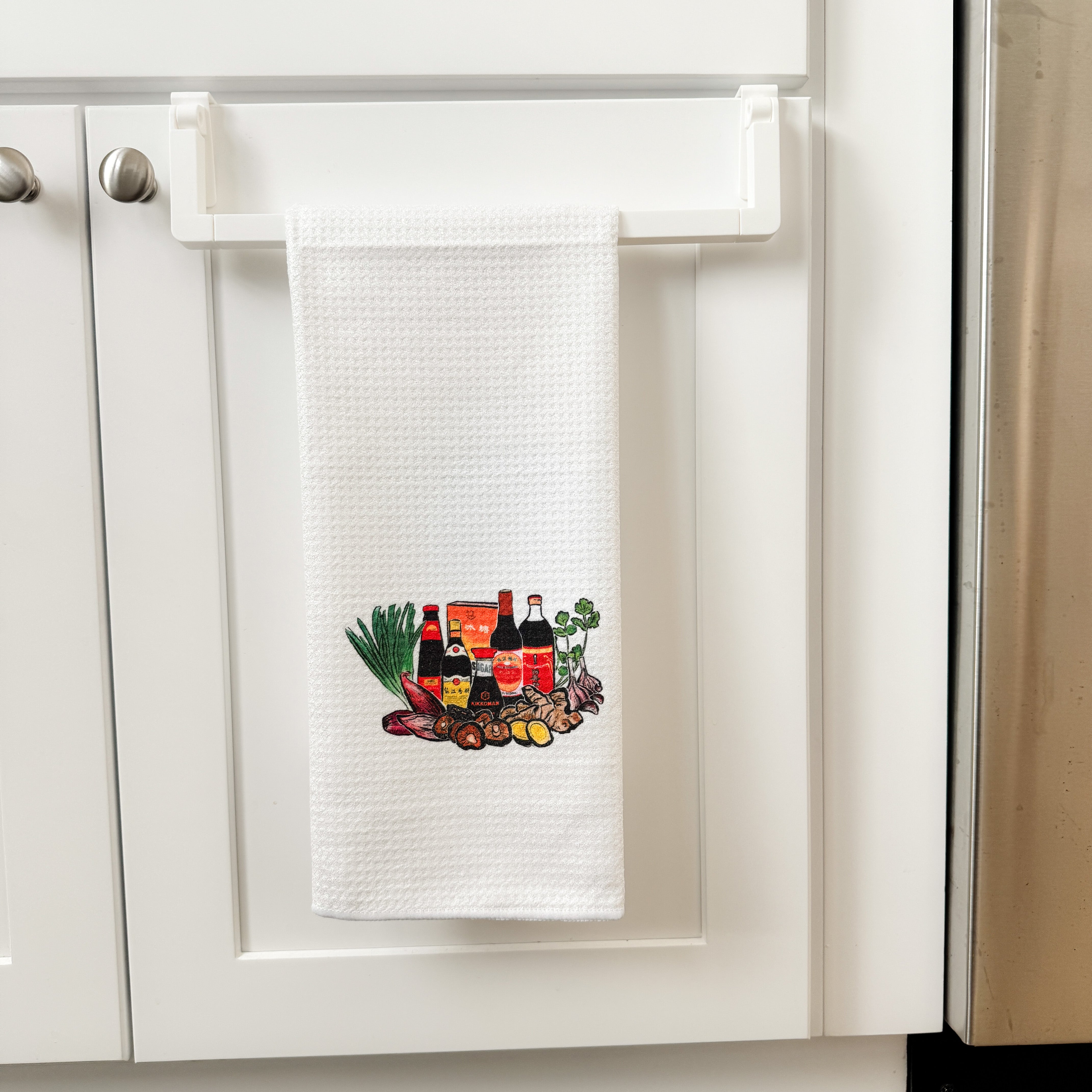kitchen towel with watercolor of Asian sauces and vegetables