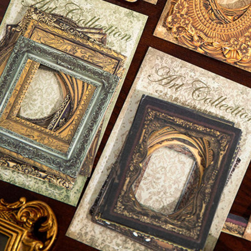 A collection of vintage-style decorative art frames displayed on patterned cards over a dark wooden surface. The frames feature ornate baroque designs in gold, bronze, black, and muted teal tones, with some cards showing the text 'Art Collection'.