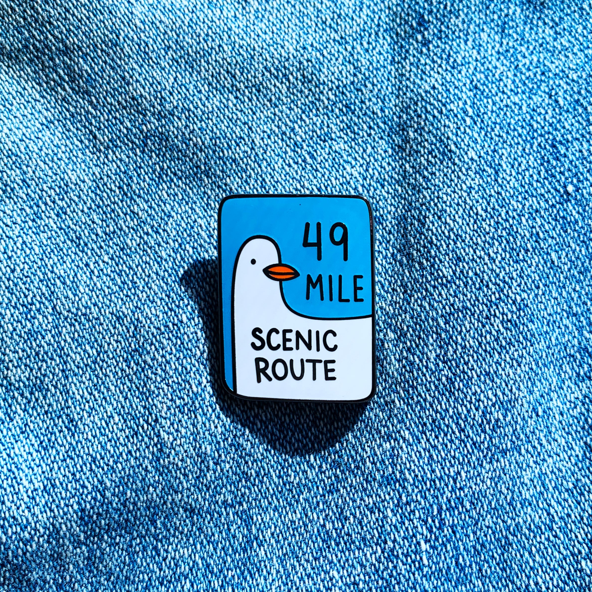 49 Mile Scenic Drive enamel pin detail