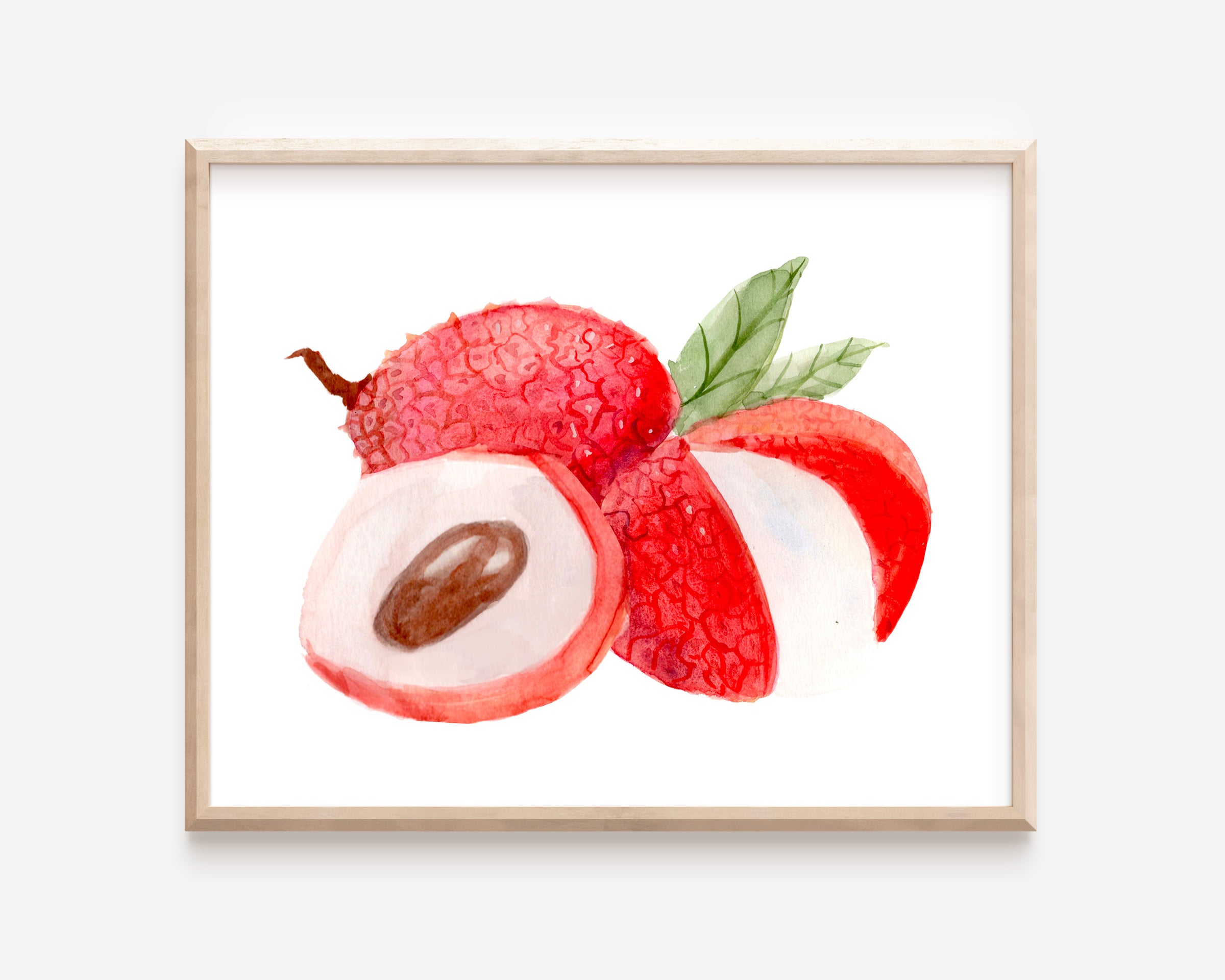 A watercolor print of red and white lychee fruit. Two lychees are peeled open to reveal a soft interior, and a pair of green leaves sprouts from one fruit.