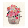 A textured Swedish dishcloth depicting a pink, blue, and white bouquet of tulips, roses, and other flowers sprouting out of a rice cooker.