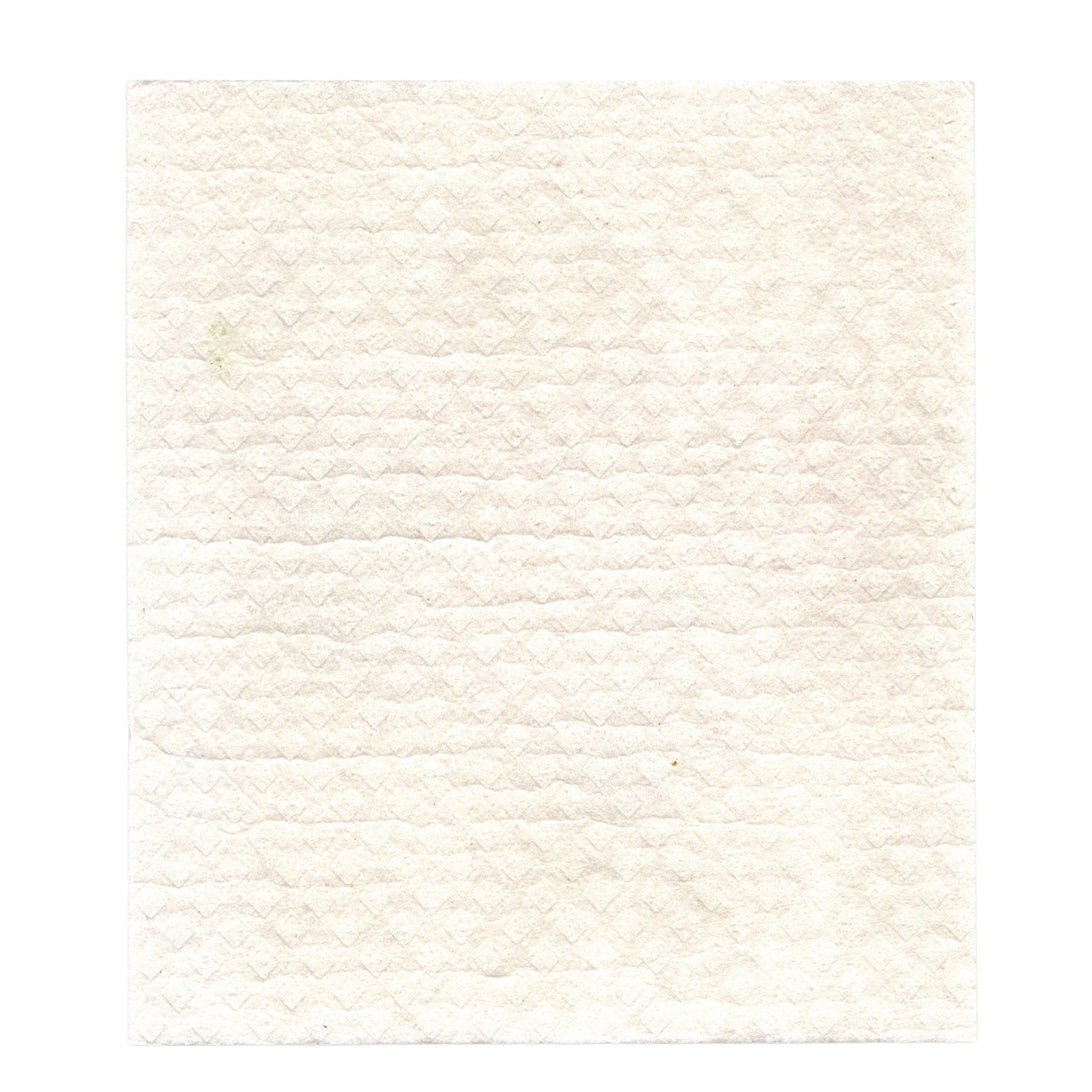 The white, textured back of a California Wildflowers Swedish Dishcloth.