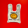 sticker of bag with smiley face and "thank you, have a nice day!"
