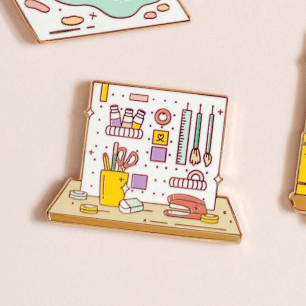 Creative Corner enamel pin close up