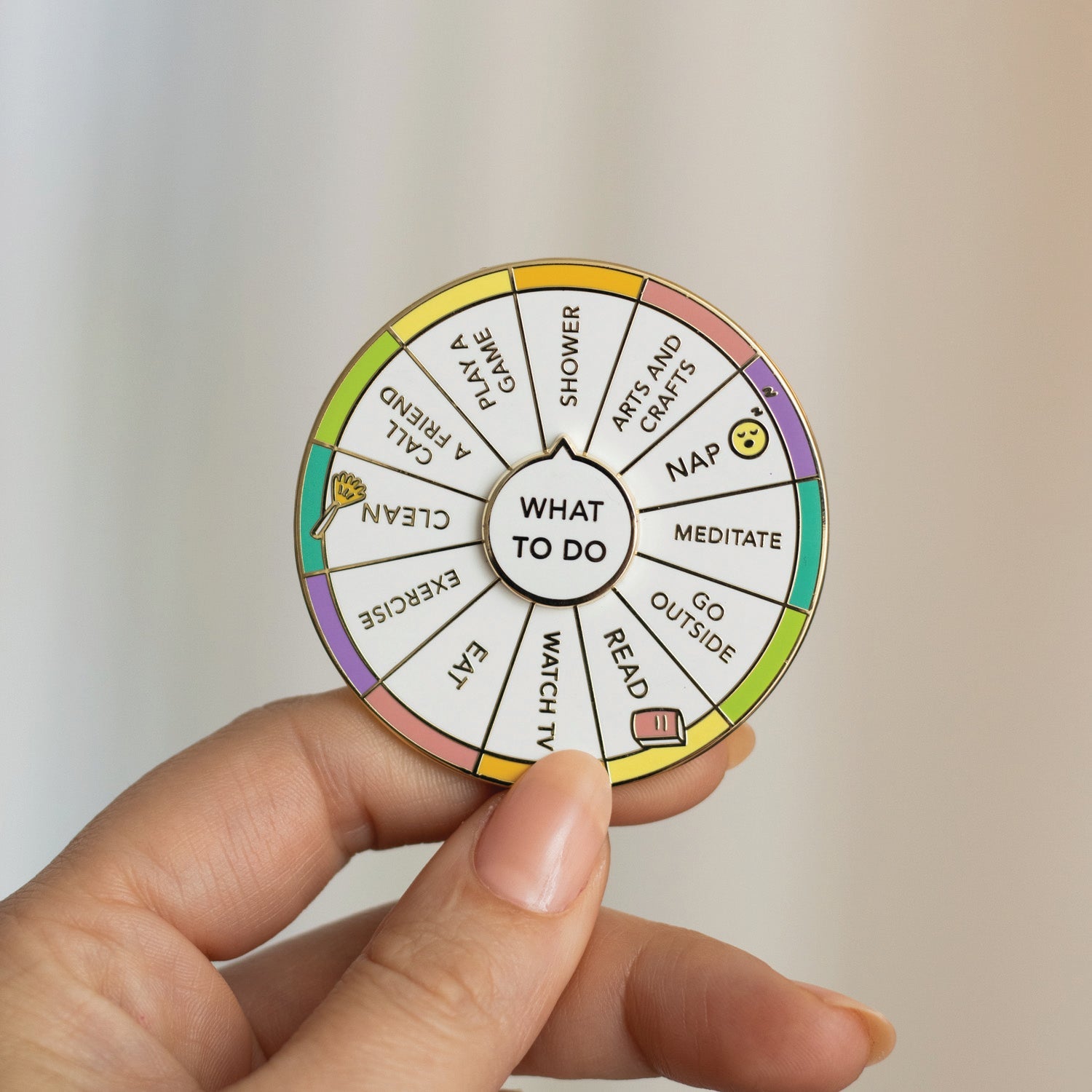 What To Do spinning enamel pin detail