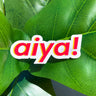 aiya! sticker on green leaf, whimsical AAPI-inspired design