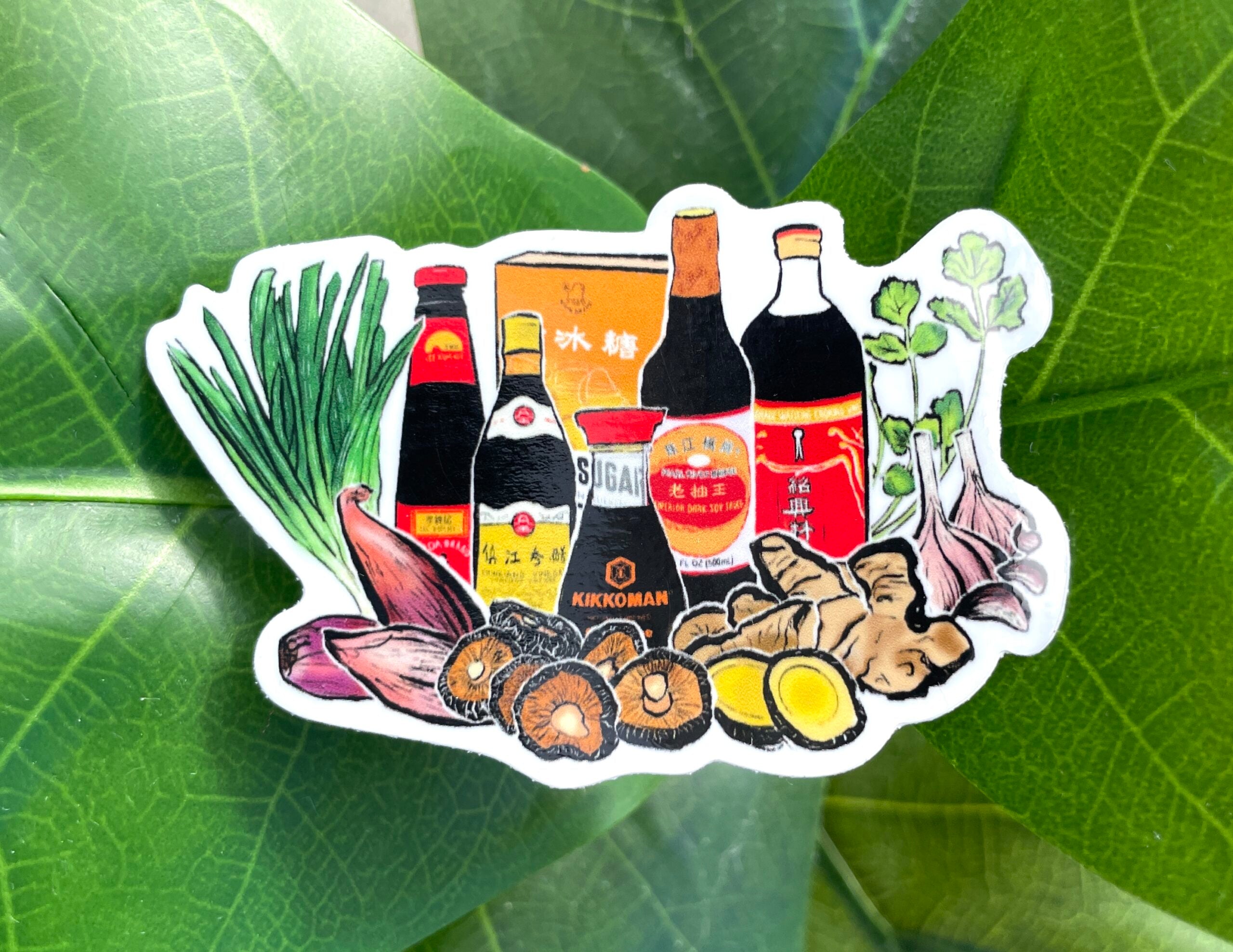 A white sticker with light and dark soy sauce, oyster sauce, Chinkiang vinegar, Shaoxing wine, ginger, green onions, garlic, and shiitake mushrooms.
