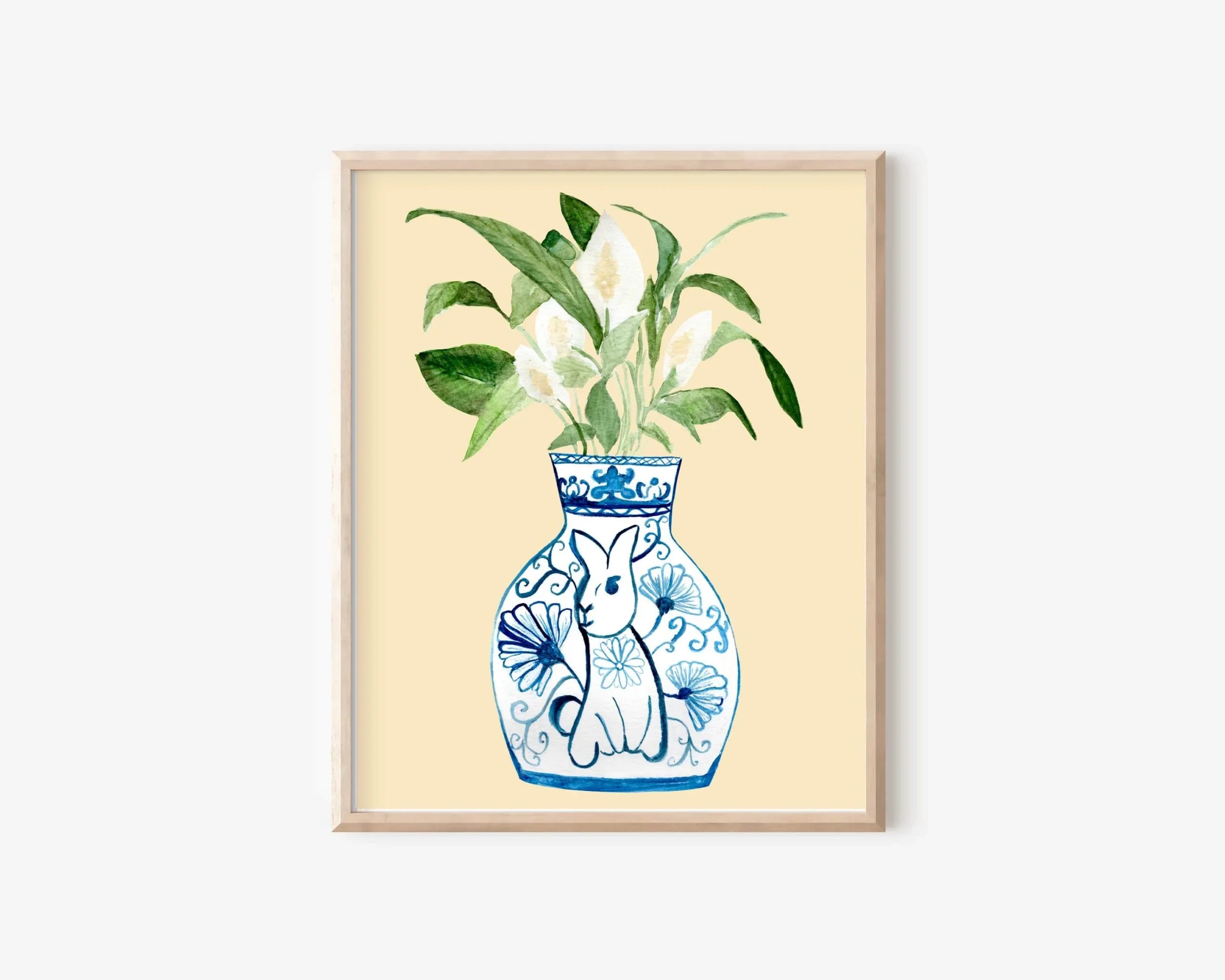 Blue and white rabbit vase print with green leaves, whimsical AAPI-inspired wall art for home decor